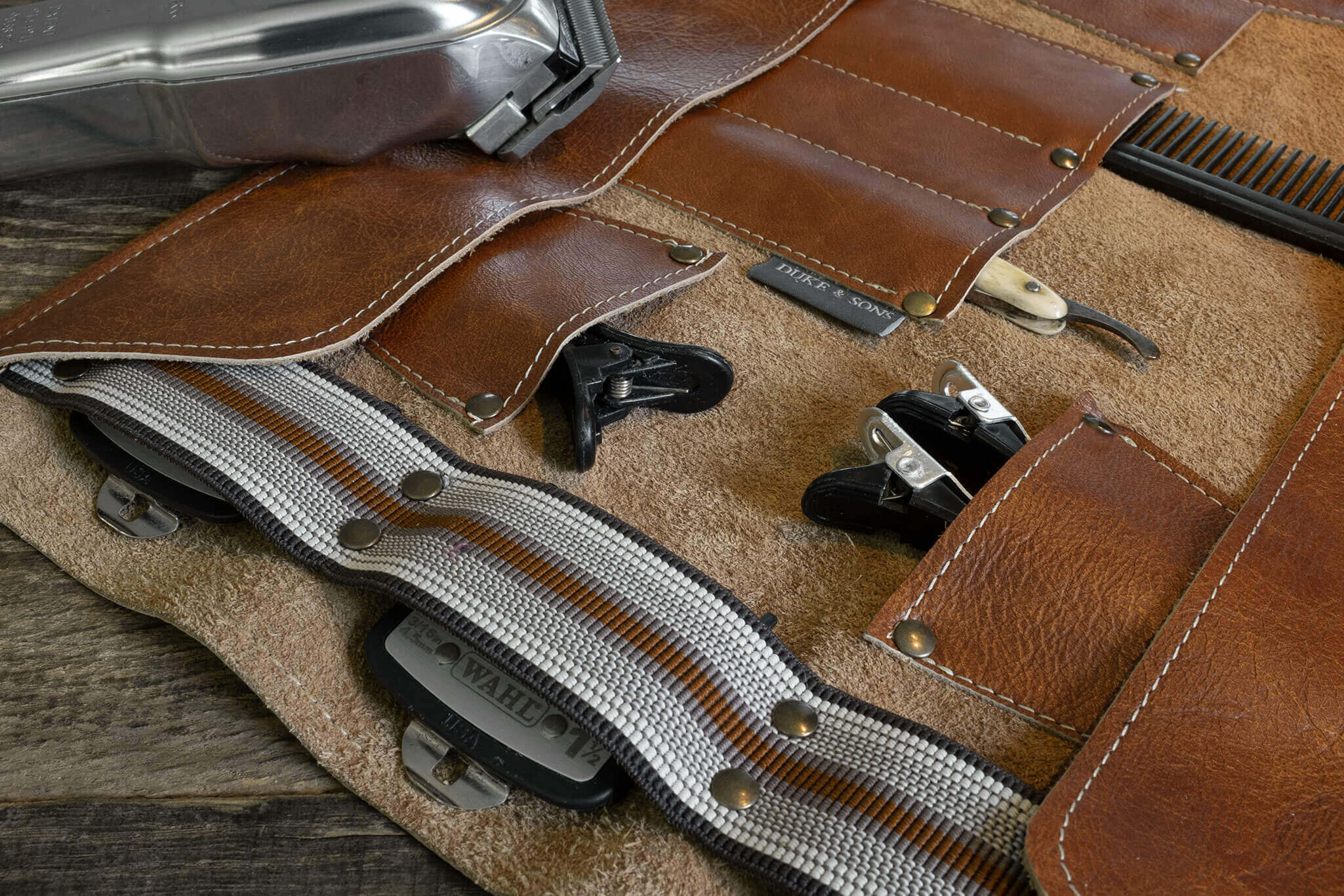 Duke and Sons Professional barber tool roll in cognac leather, Wahl clipper elastic strap