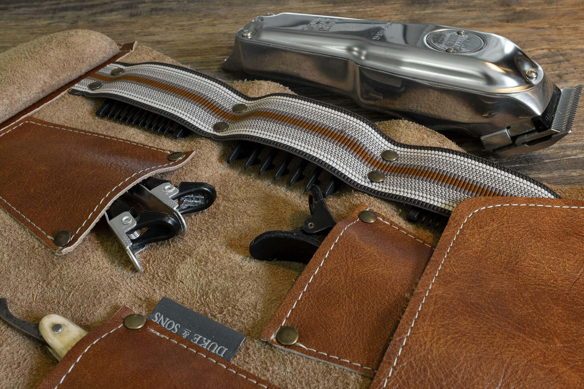 Duke and Sons Professional barber tool roll in cognac leather, close-up