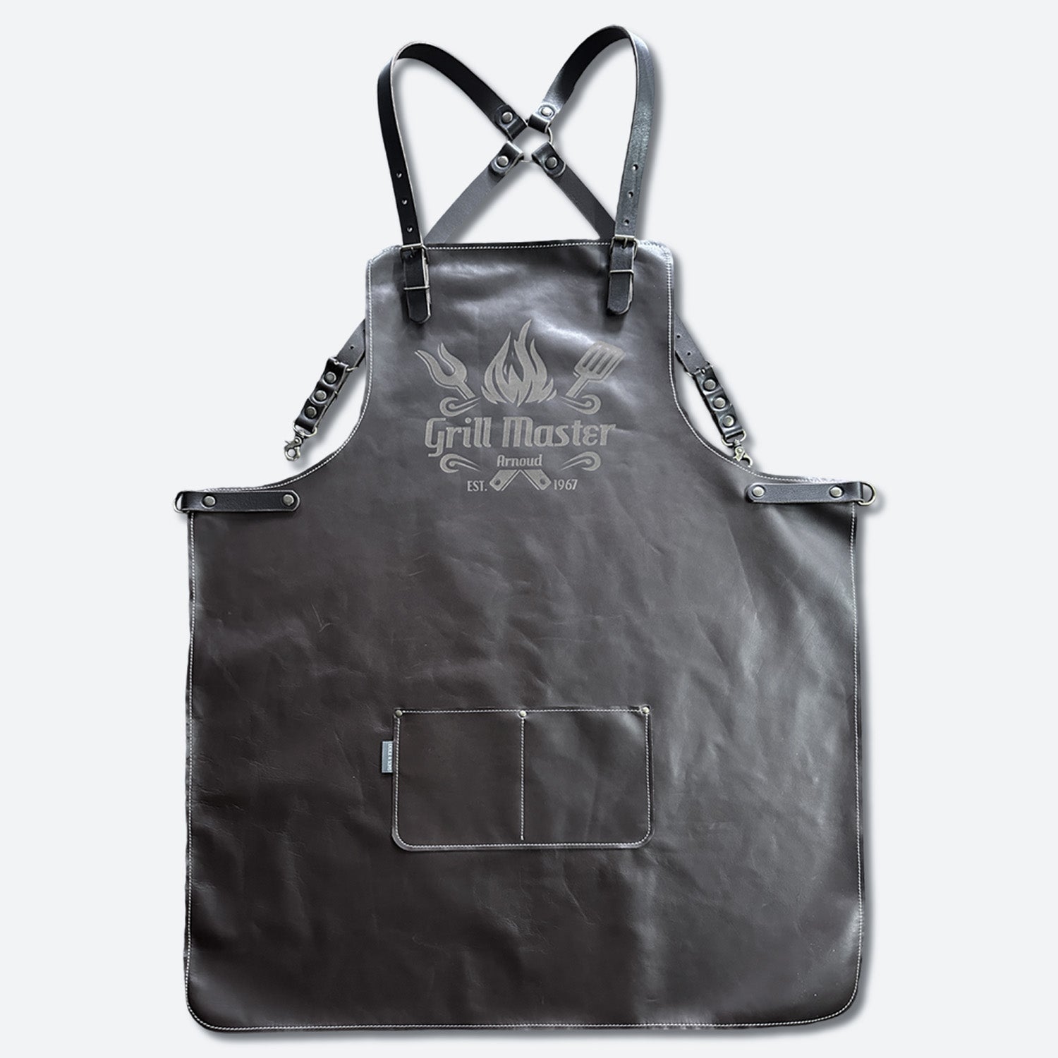 Black apron with 'Grill Master' logo on a light gray background