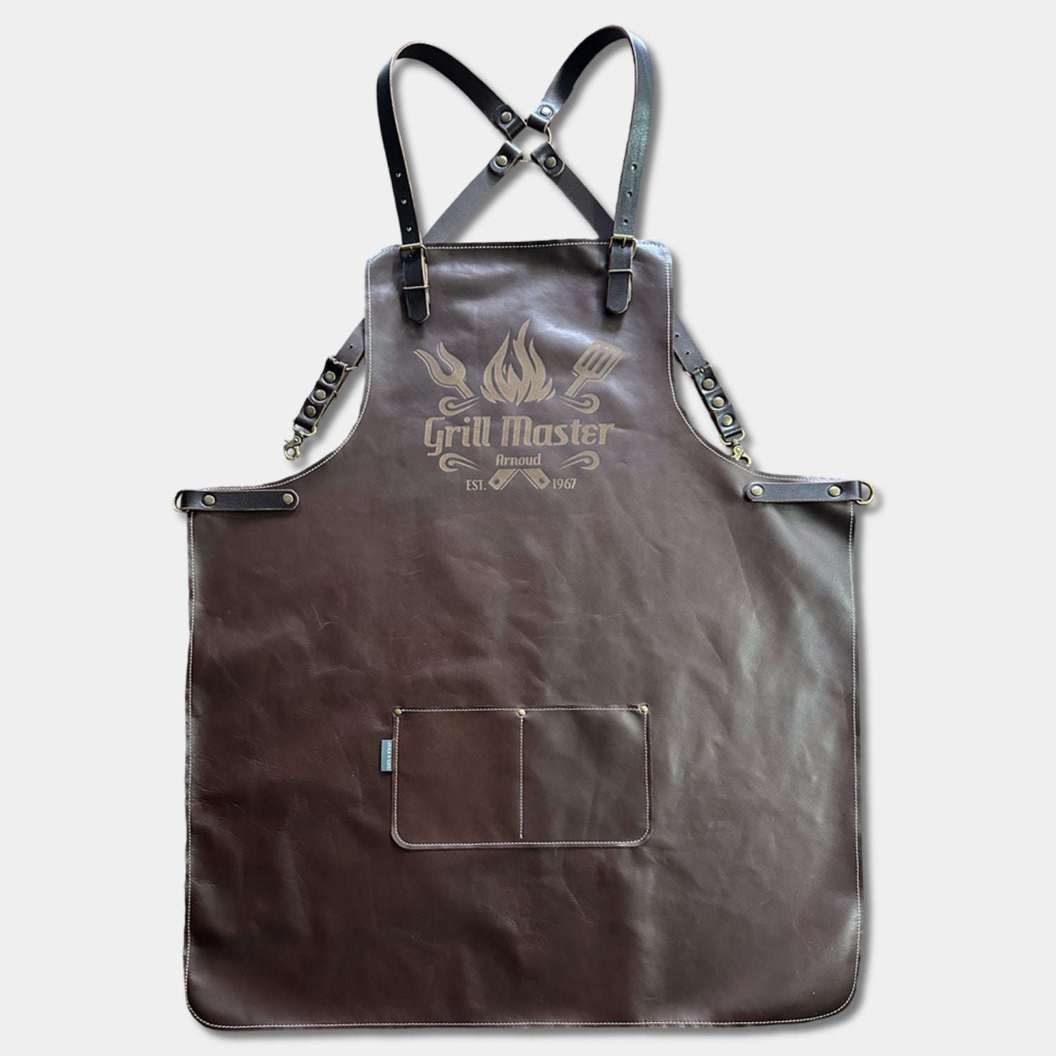 Brown apron with 'Grill Master' logo on a light gray background