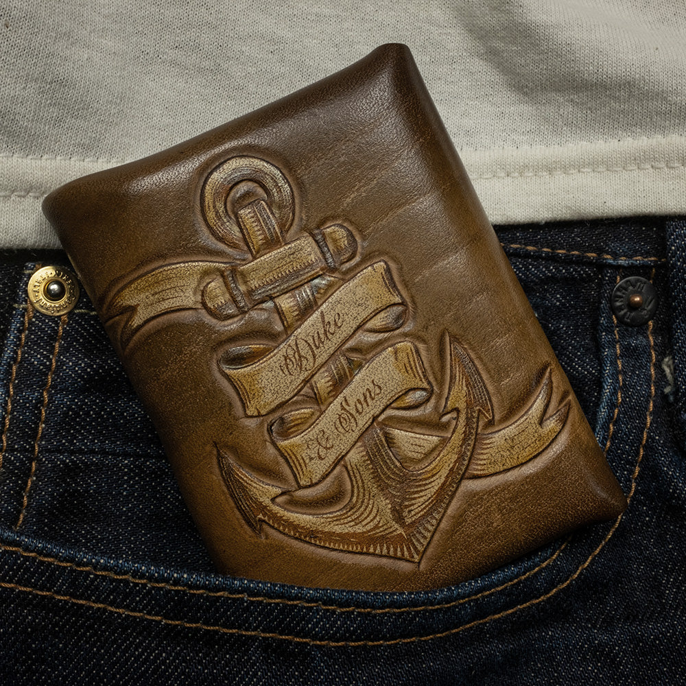 Pocket wallet with anchor in jeans pocket back view