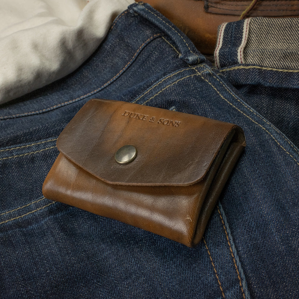 Pocket wallet top view on denim scene