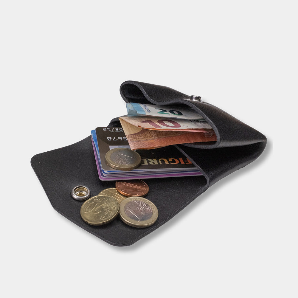 Pocket wallet black, open with money and cards, slanted view