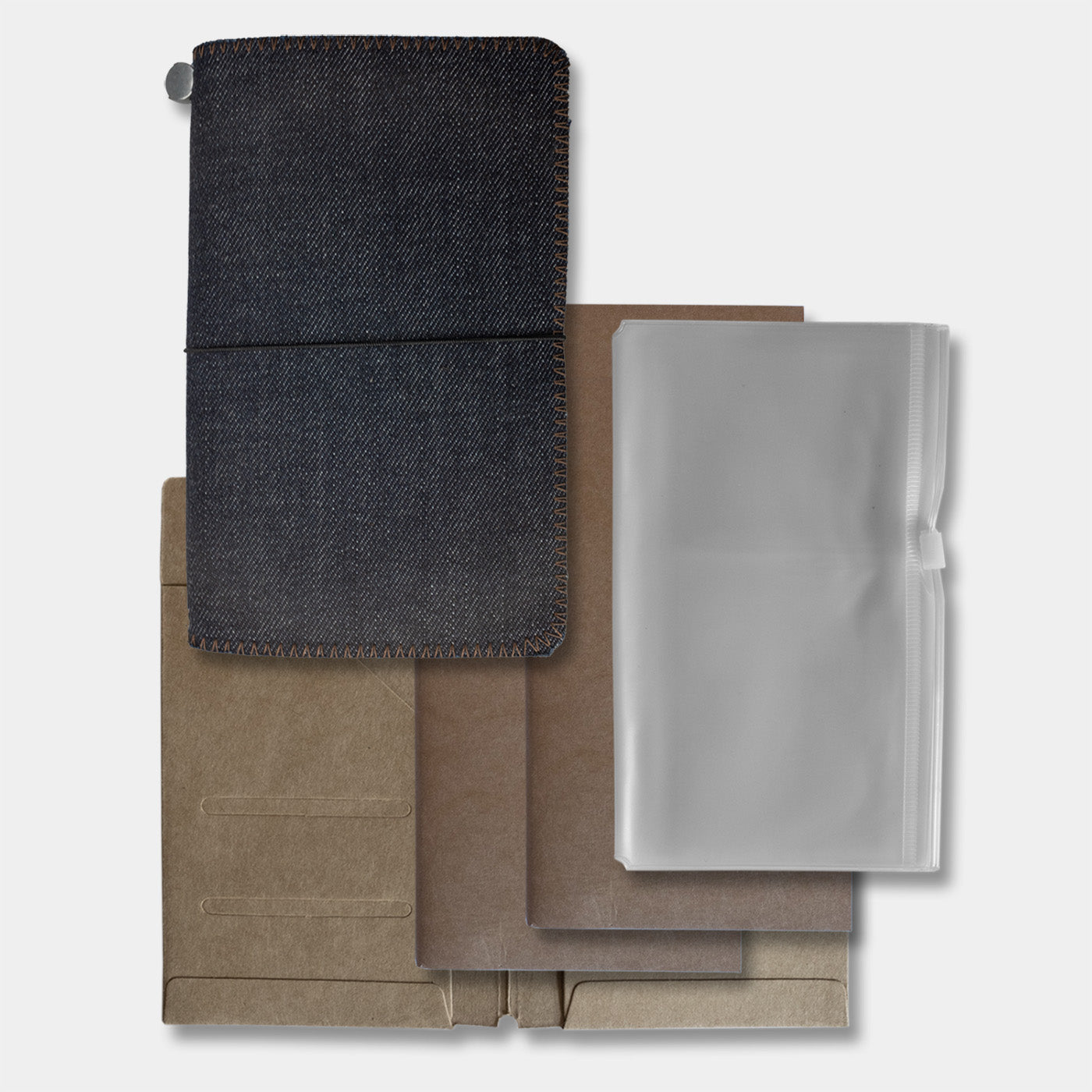 Duke and Sons denim traveler's notebook front + parts