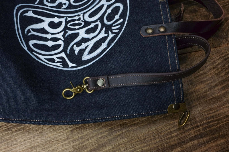 detail inside keychain, selvedge denim tote bag, hand drawn logo born to ride scene front