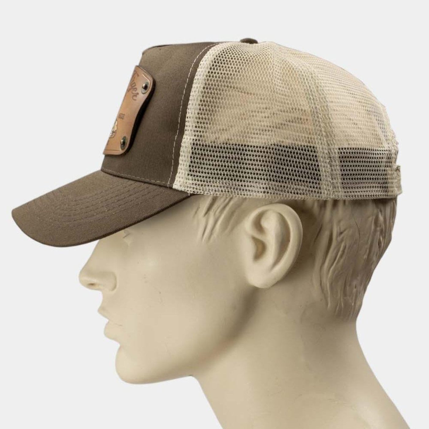 wearing brown trucker cap with handmade leather patch white tiger side | Duke and Sons Leather