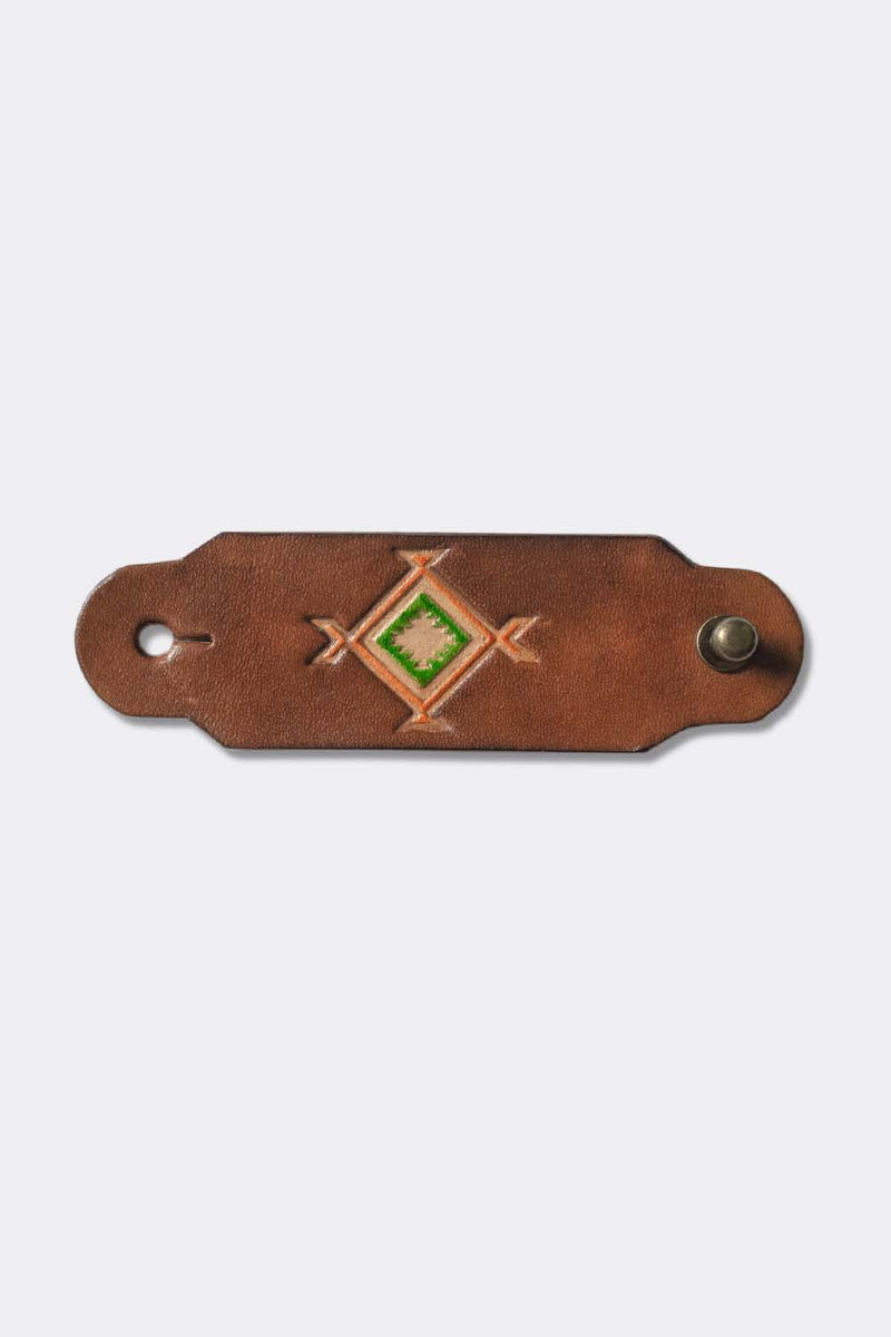 Woggle, bandana / neckerchief slide in cognac leather with a square native pattern stamp