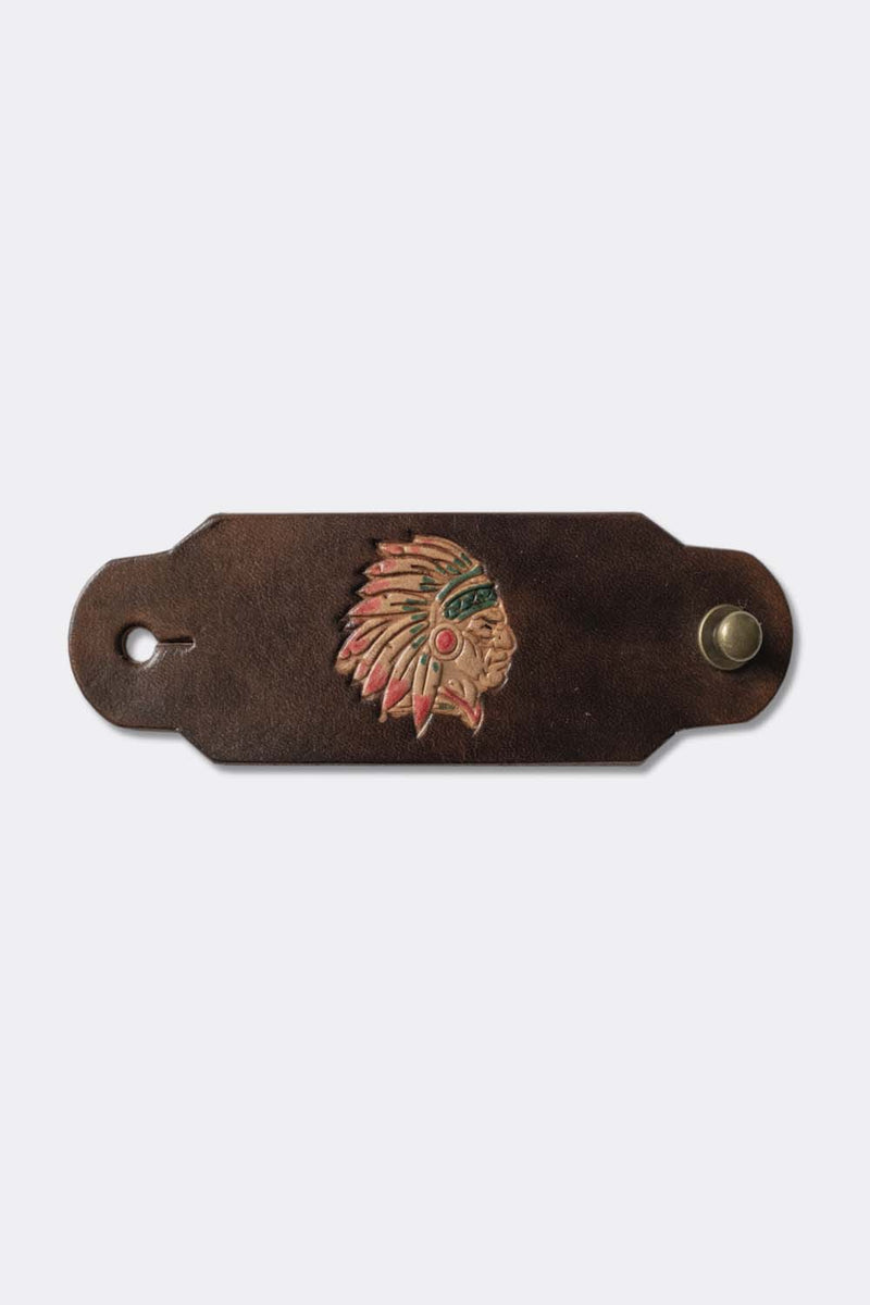 Woggle, bandana / neckerchief slide made from brown leather with an Indian Chief image stamp