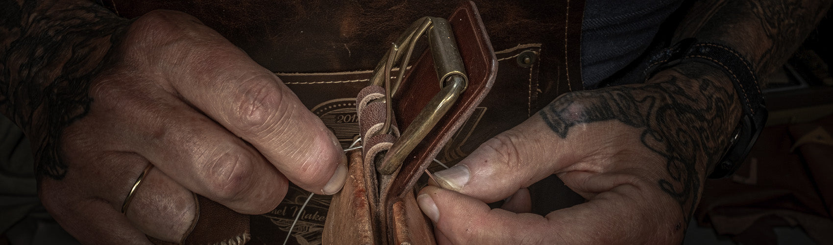 Heavy duty handmade leather belt on a selvede denim, Duke and Sons Leather