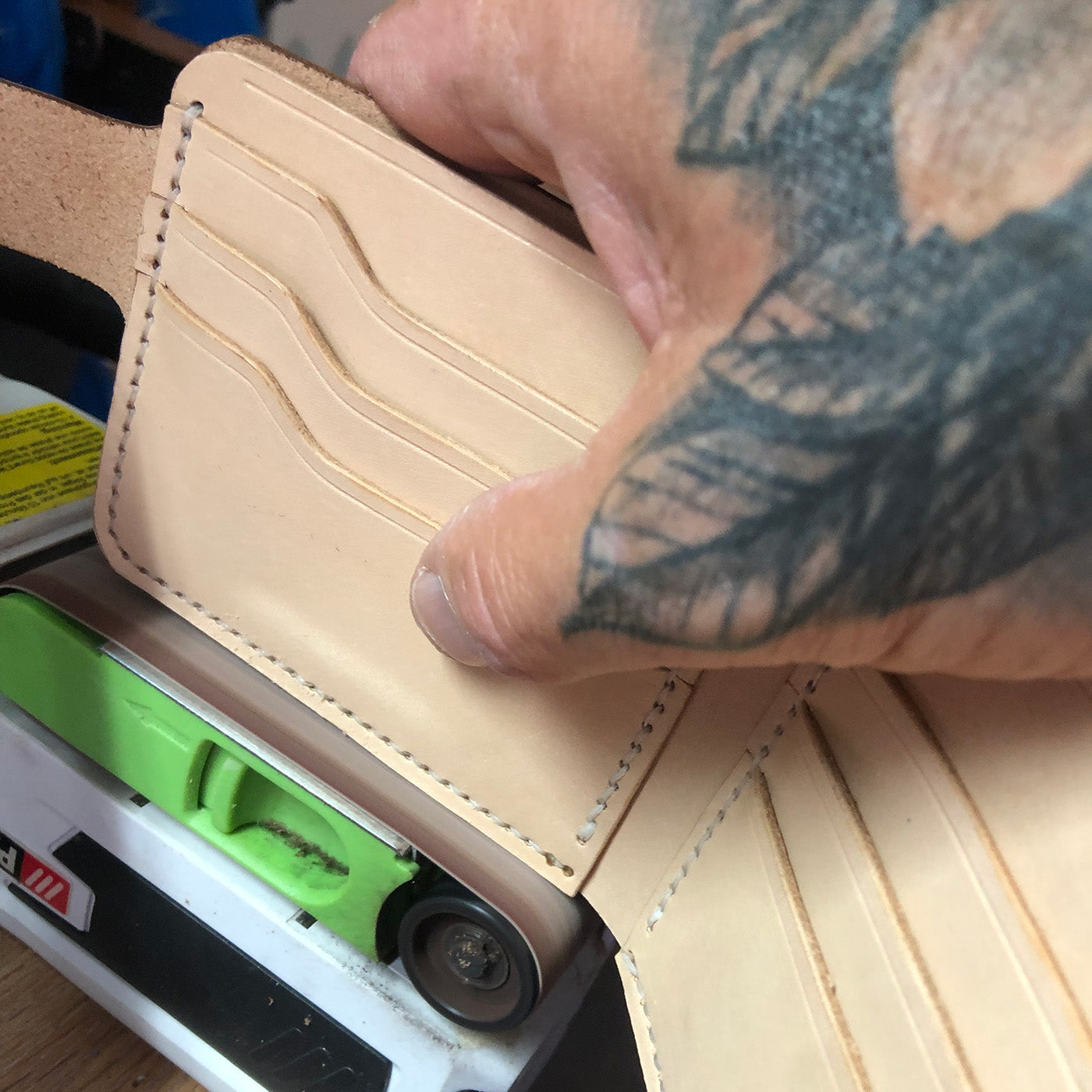 Sanding the edges for perfect result, bifold wallet Duke and Sons