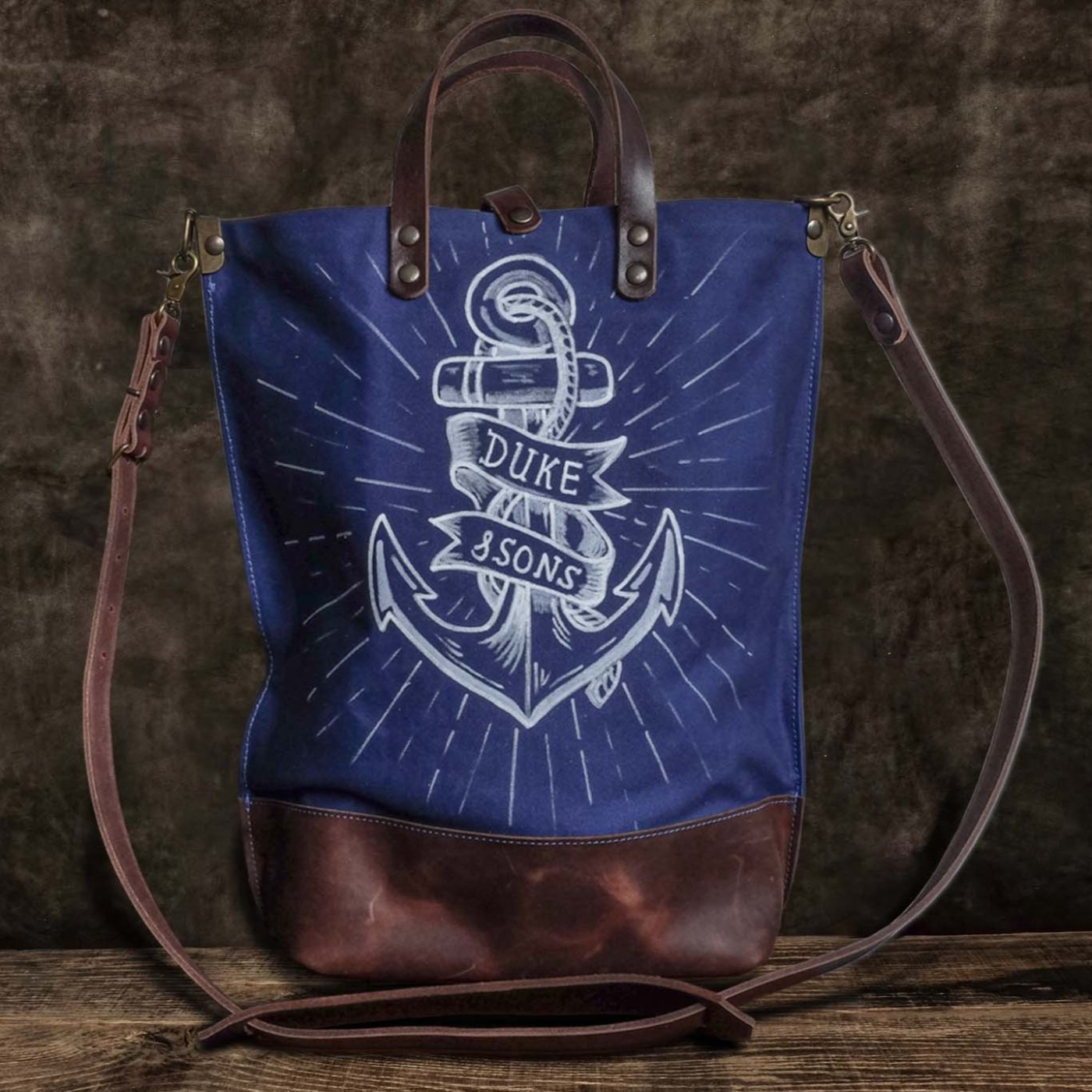 handmade blue canvas tote bag with white anchor image front scene