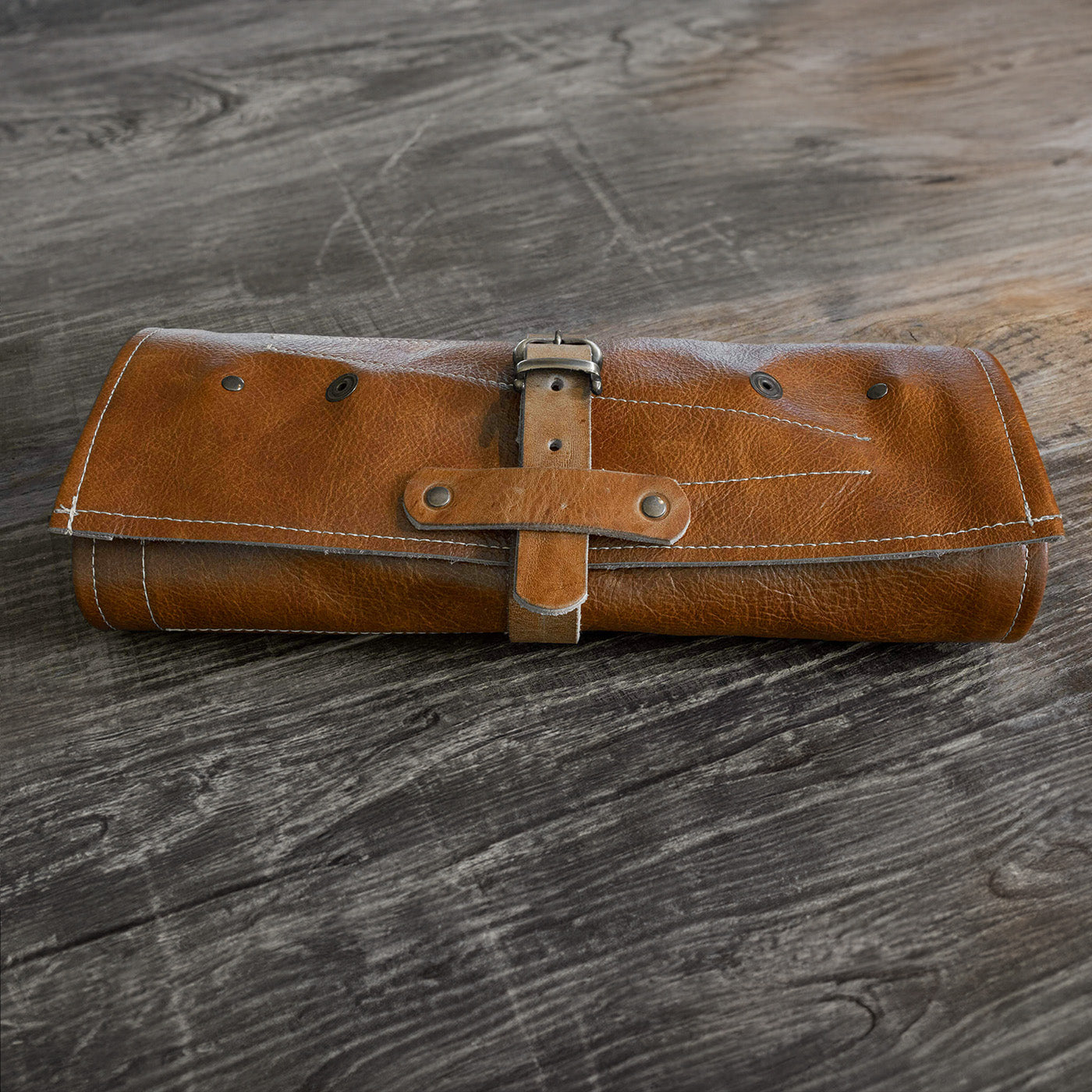Duke and Sons Professional barber tool roll in cognac leather, closed