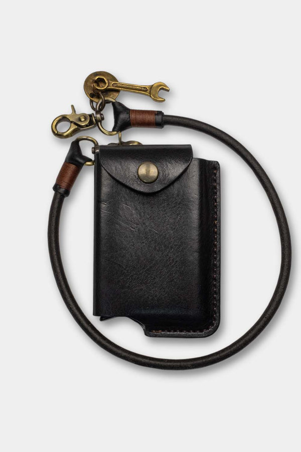 Duke and Sons black leather RFID safe Rider wallet with leather keychain, close