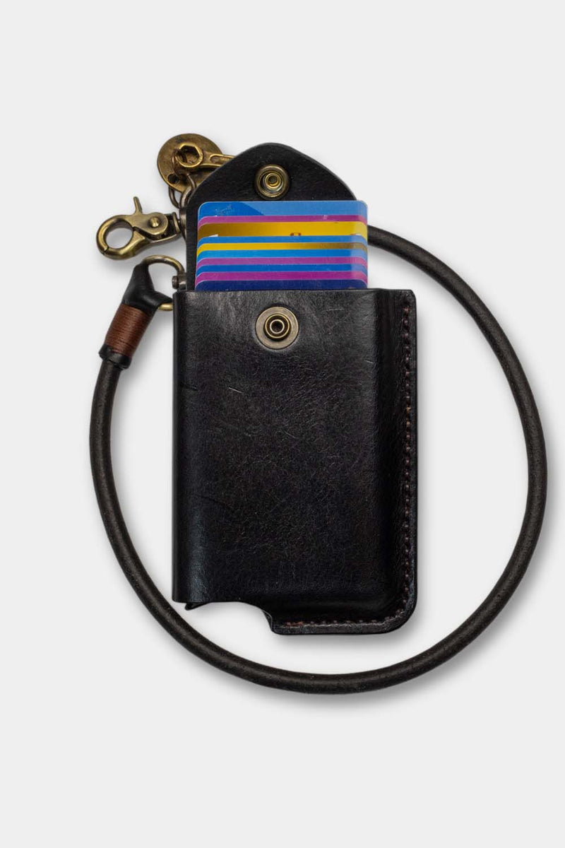 Duke and Sons black leather RFID safe Rider wallet with leather keychain, open