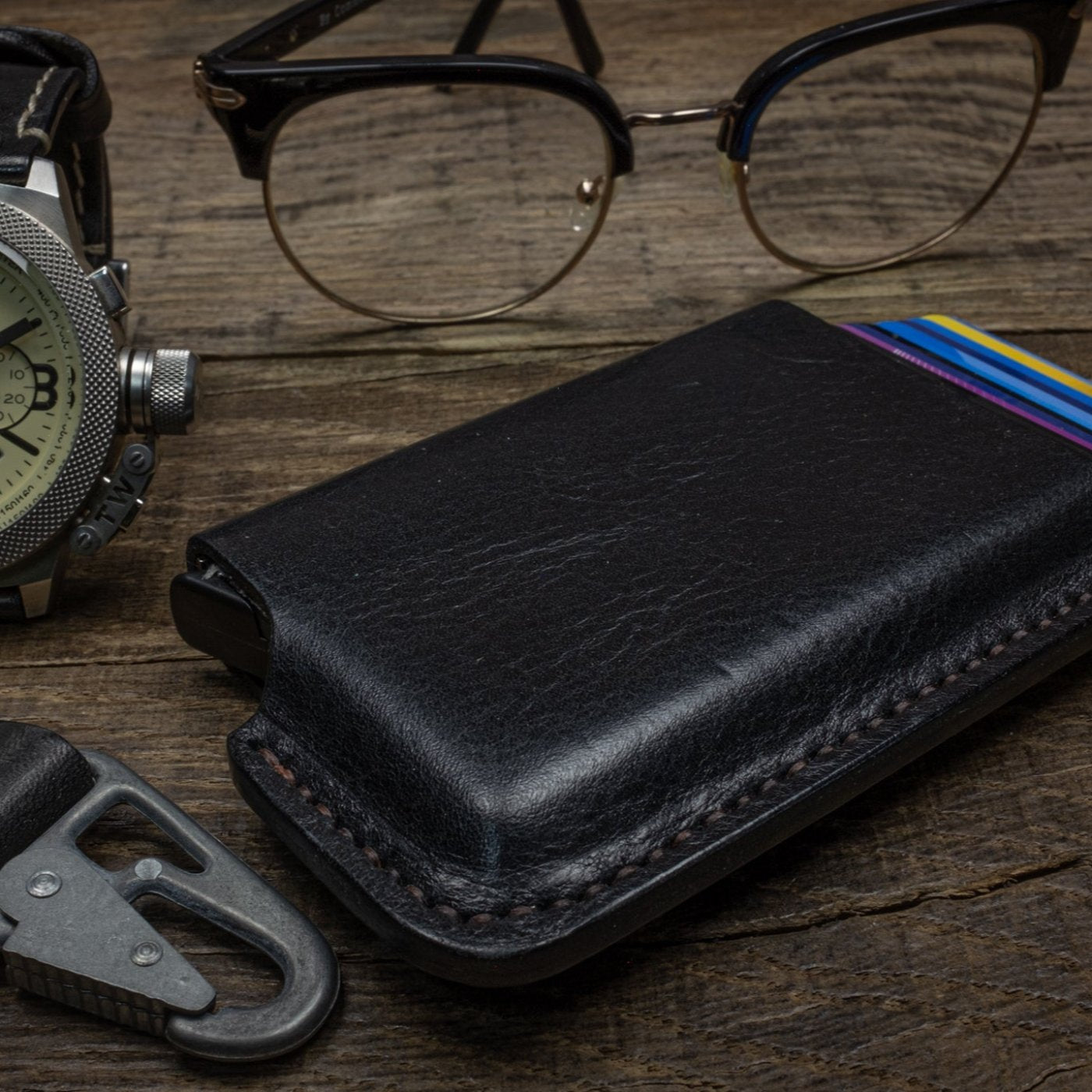 Duke and Sons black RFID protected wallet with glasses and watch scene