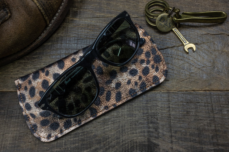 Leather sunglasses pouch with panther print scene 1