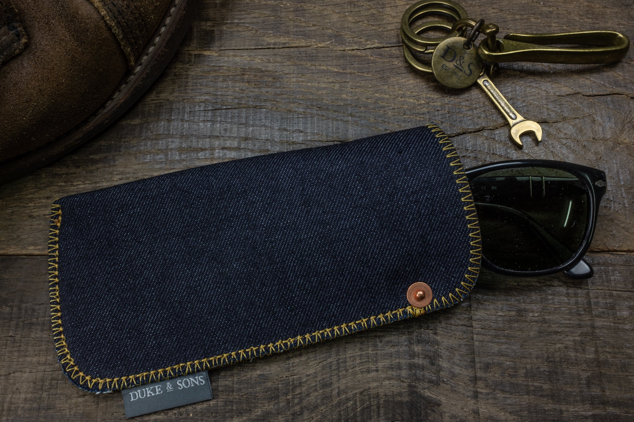 Selvedge denim sunglass pouch yellow stitch scene 1