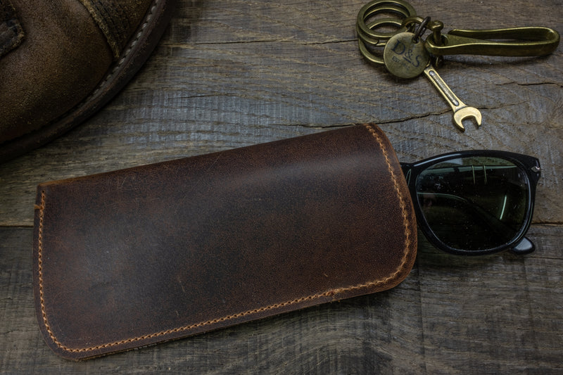 Distressed brown leather sunglass pouch glasses scene 3