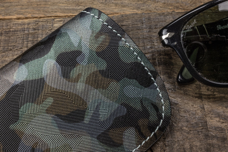 Leather sunglass pouch in space camo detail