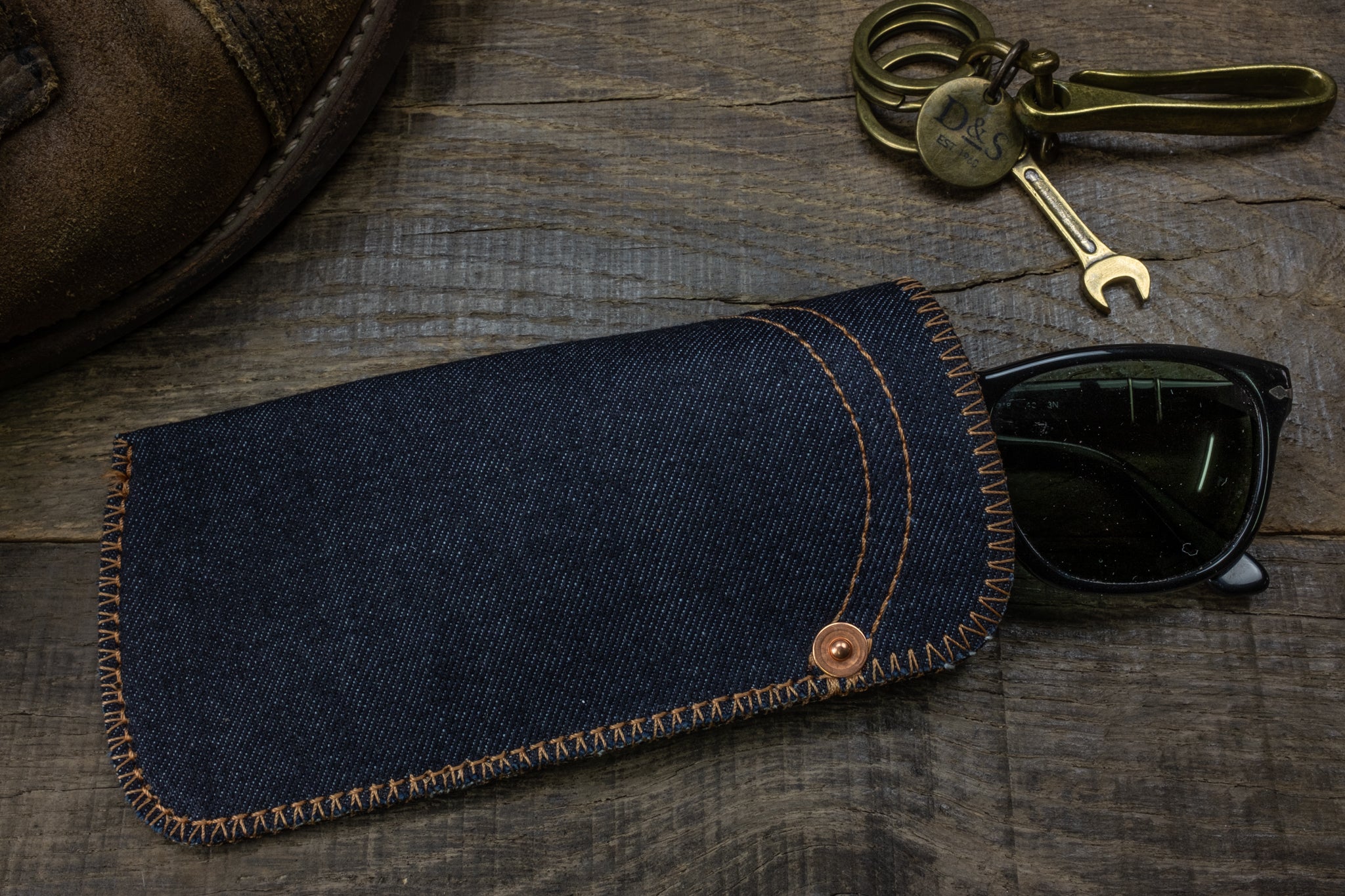 Selvedge denim sunglass pouch orange wing scene 1