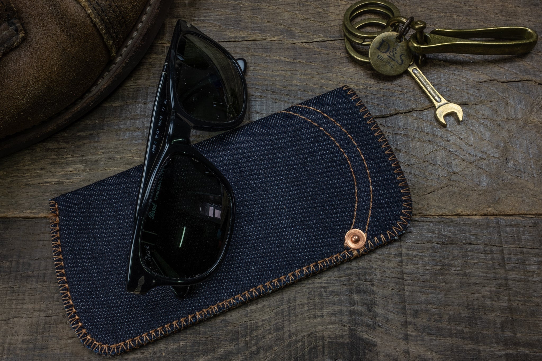 Selvedge denim sunglass pouch orange wing scene 2