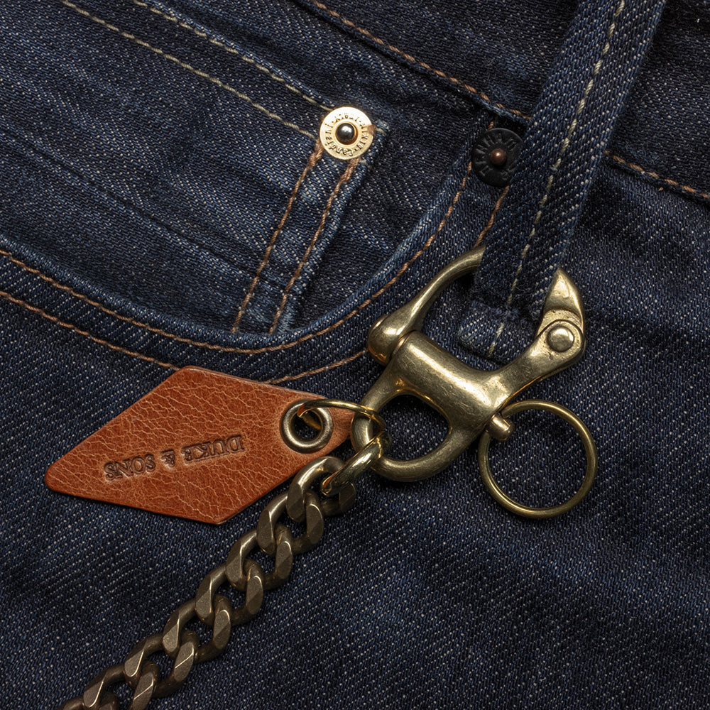 solid brass keychain with Swedish nautical shackle and cognac leather diamond charm on belt loop