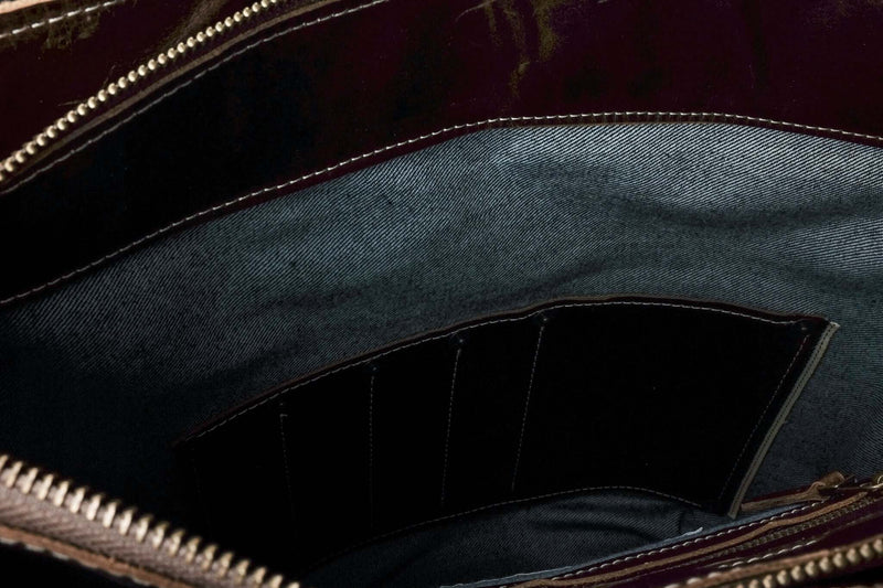 handmade leather and Wabash tote bag with Traveller image scene inside pocket detail
