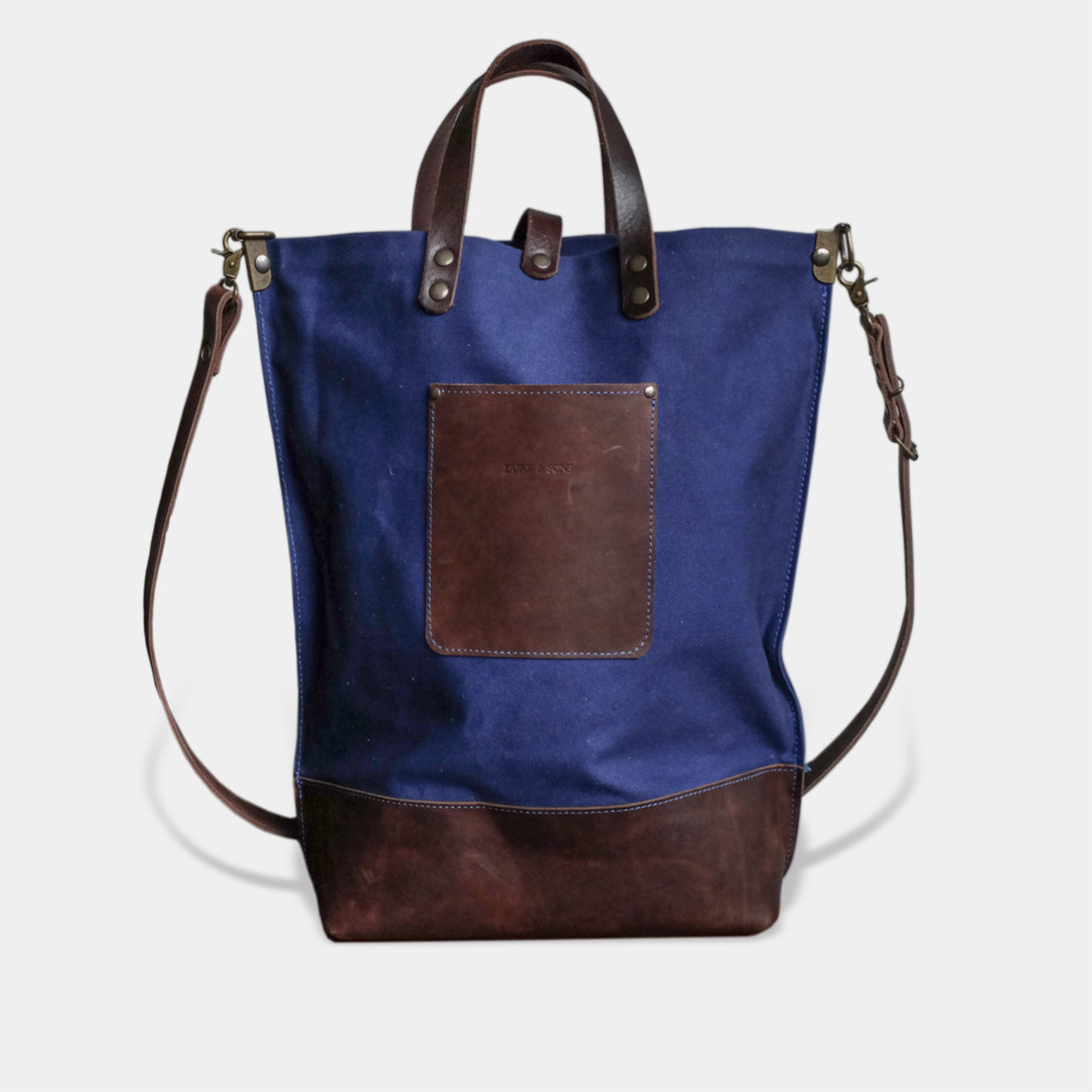 handmade blue canvas tote bag with white anchor image back
