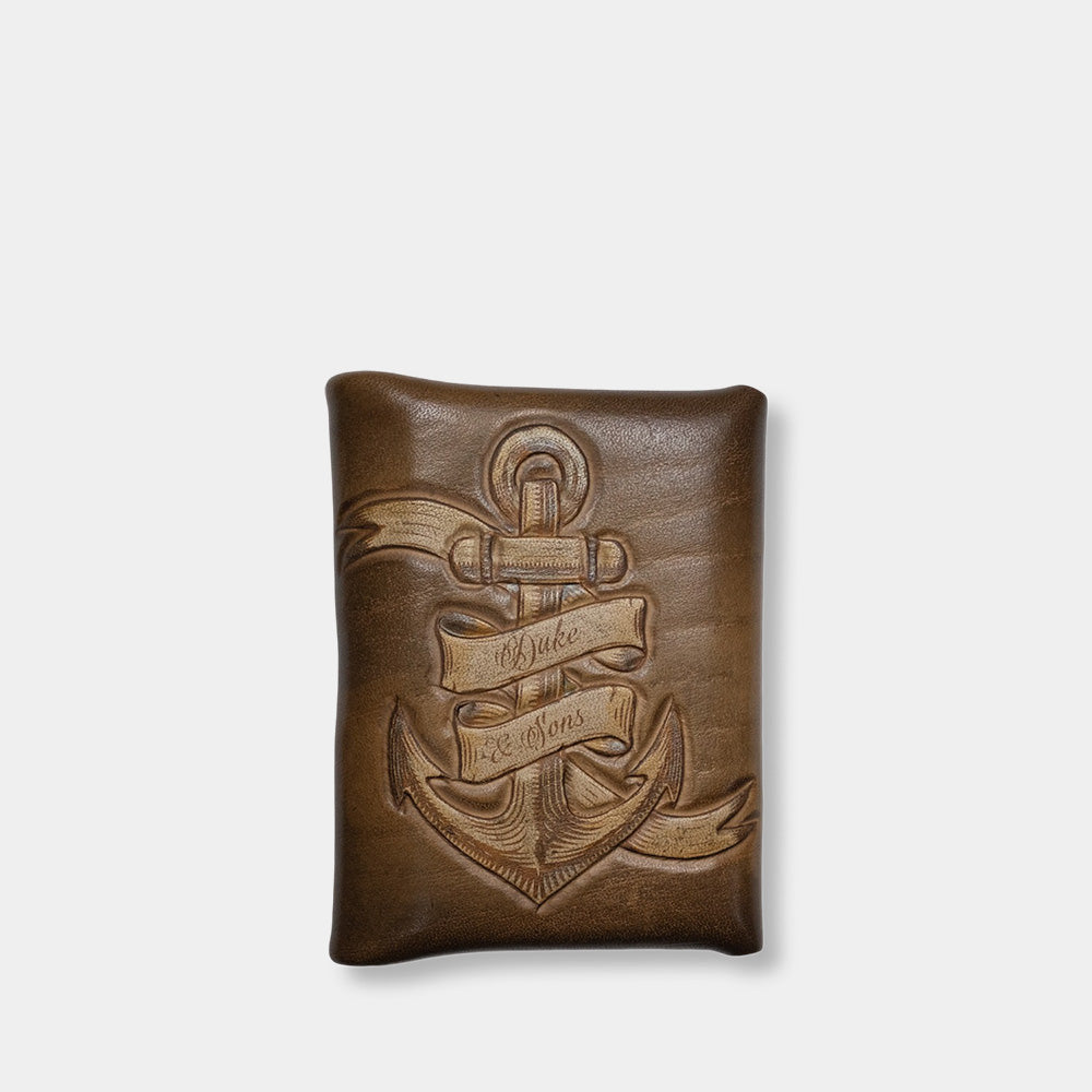 Pocket wallet with embossed and colored anchor. back side