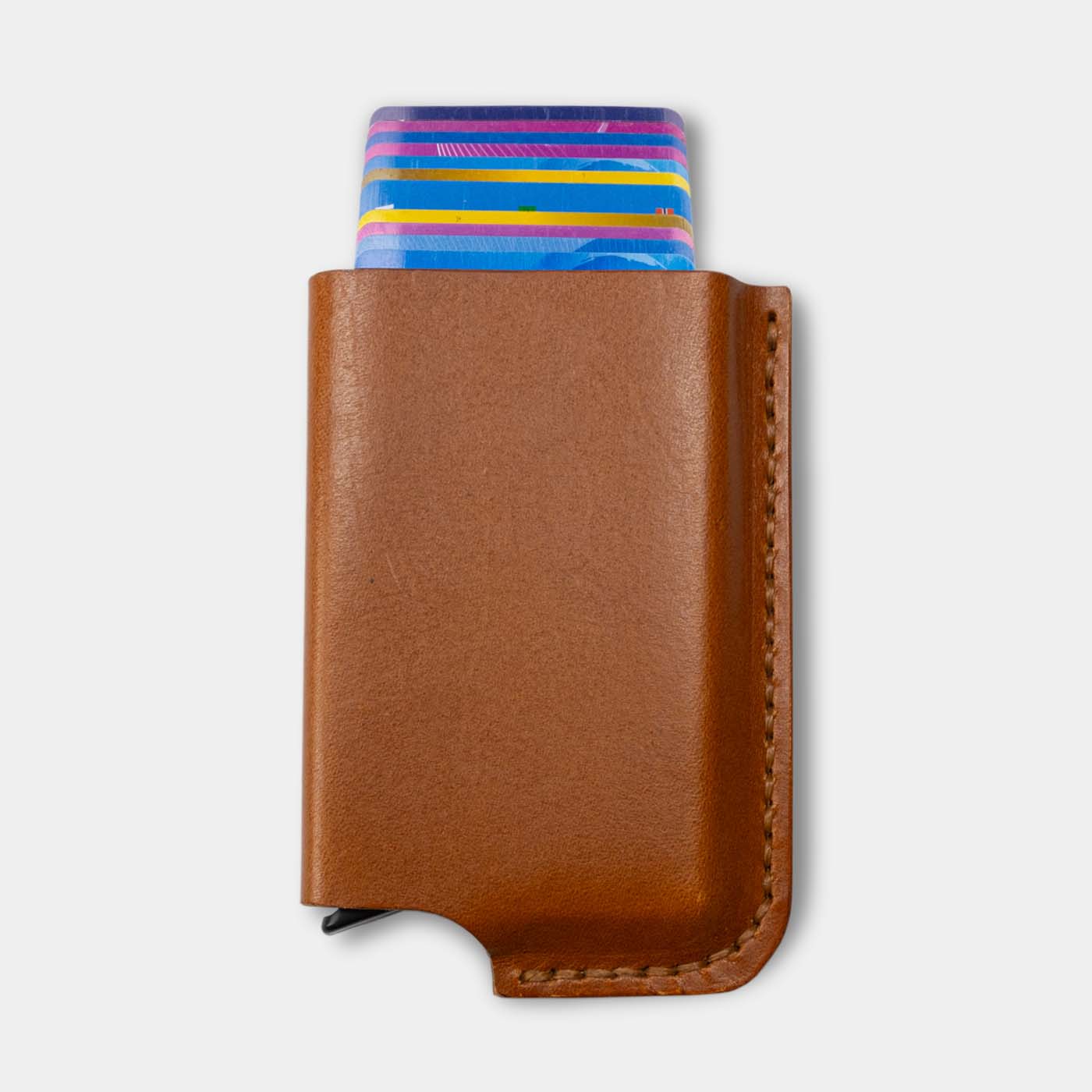 Card wallet, RFID safe with aluminum insert for 10 cards front in cognac leather. cards out - Duke & Sons Leather