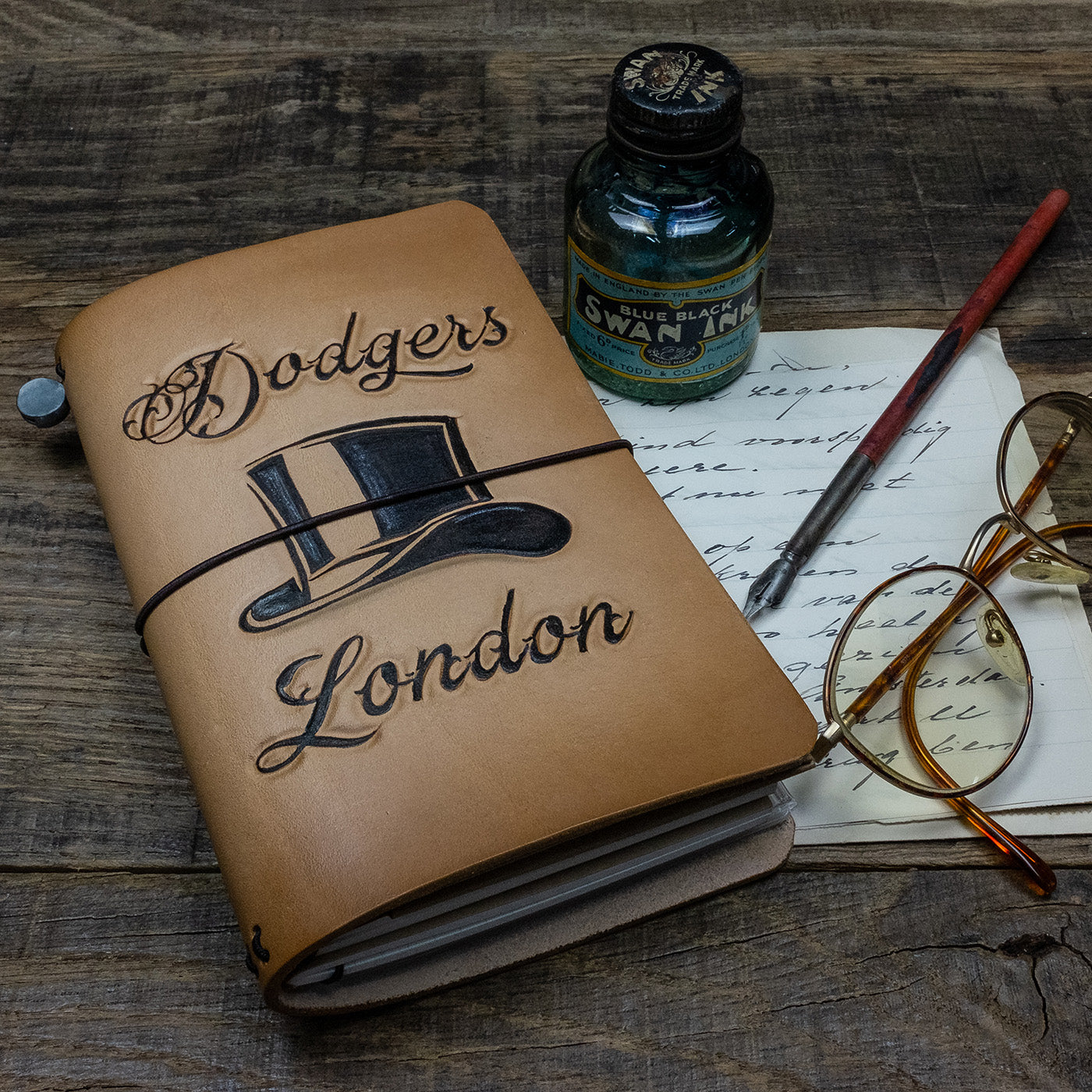 Duke and Sons vegetan leather Traveler notebook with custom logo scene top
