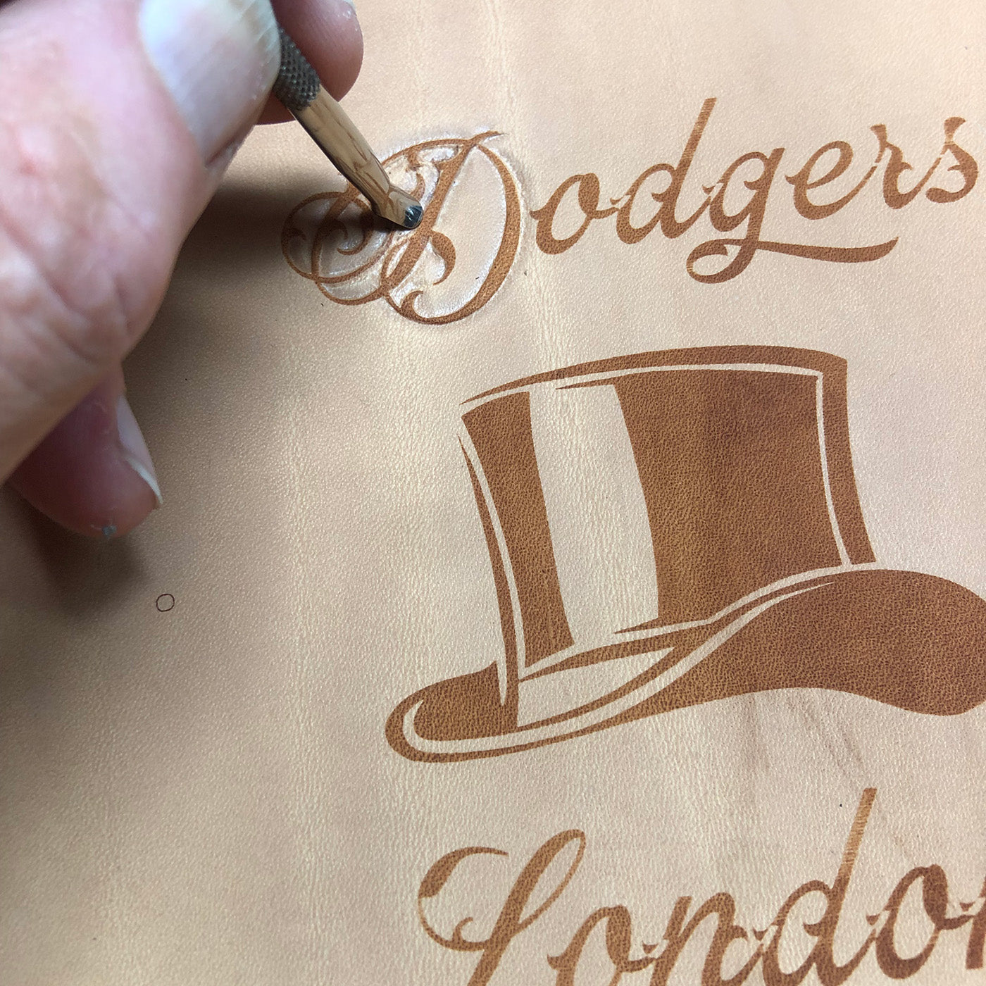 Embossing the text on the Duke and Sons Notebook