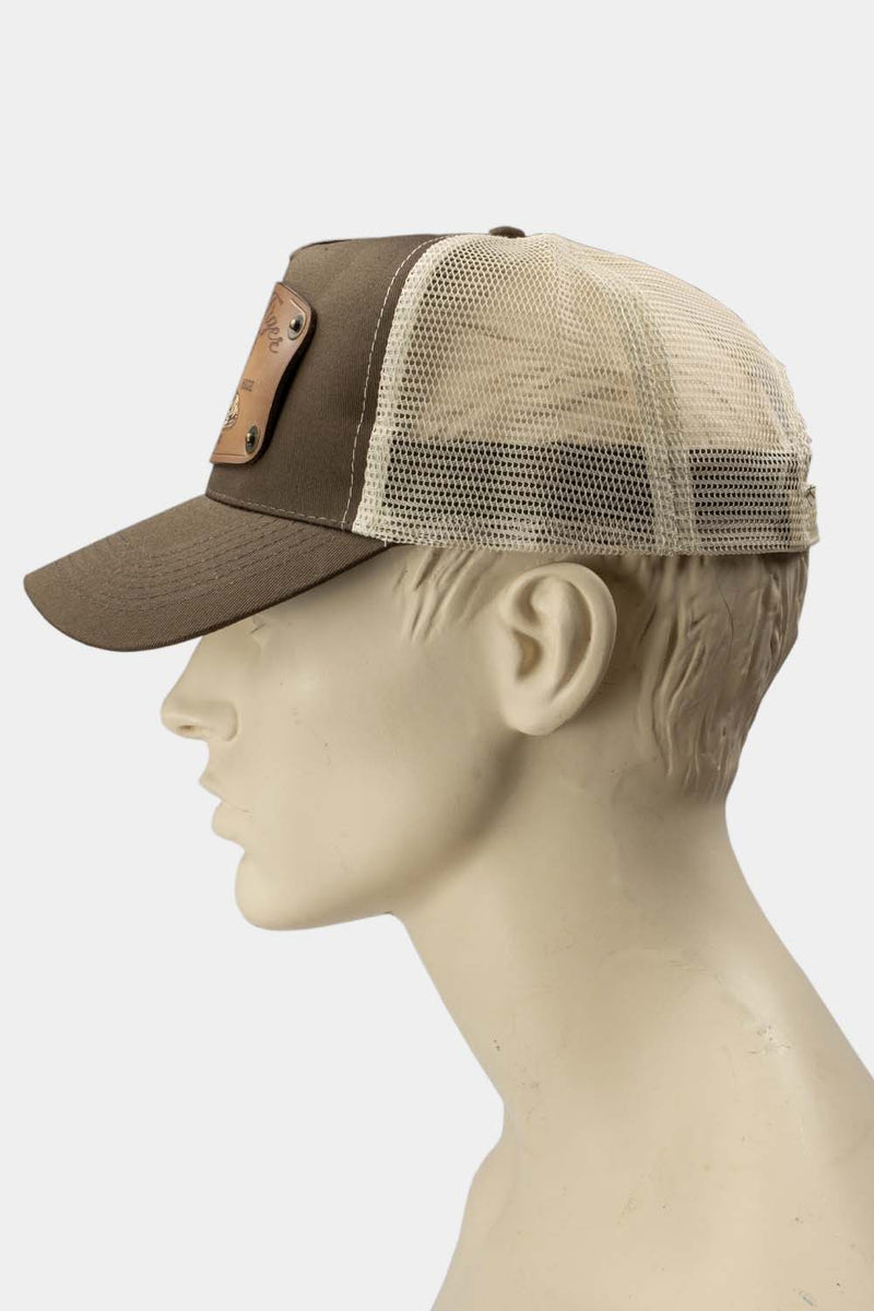 wearing brown trucker cap with handmade leather patch white tiger side | Duke and Sons Leather