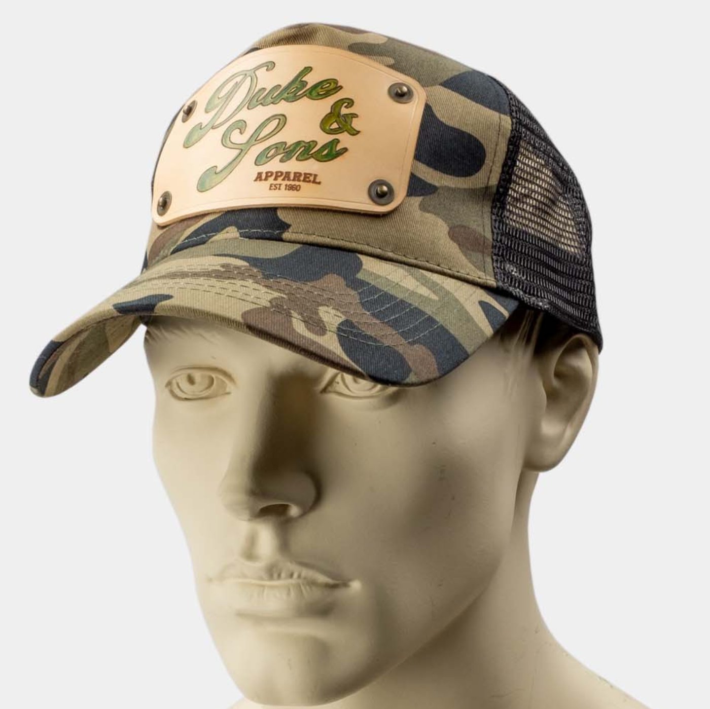 wearing Camo trucker cap with handmade leather patch apparel front | Duke and Sons Leather