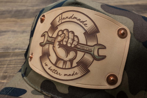 detail Camo trucker cap with handmade leather patch spanner | Duke and Sons Leather