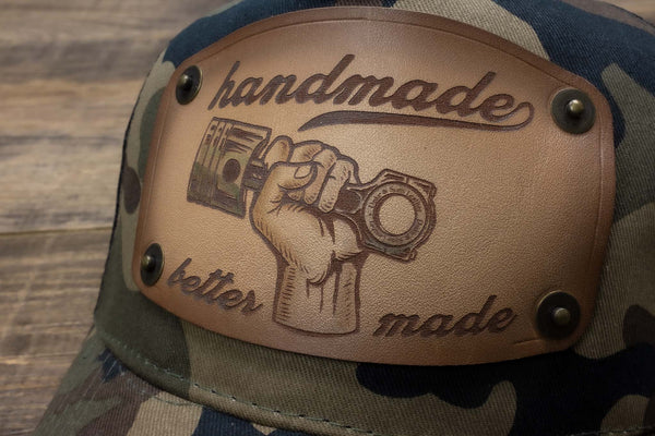 detail Camo trucker cap with handmade leather patch piston | Duke and Sons Leather