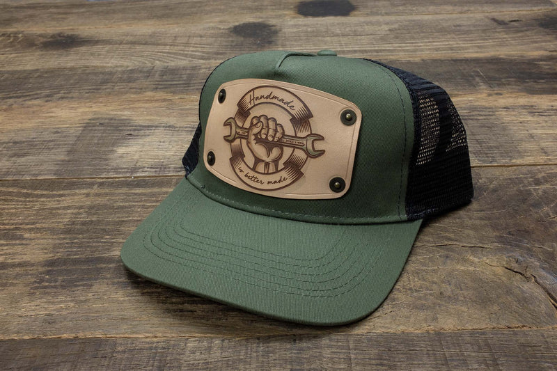 Green trucker cap with handmade leather patch spanner | Duke and Sons Leather