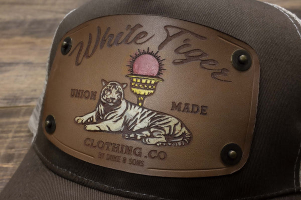 detail brown trucker cap with handmade leather patch white tiger | Duke and Sons Leather