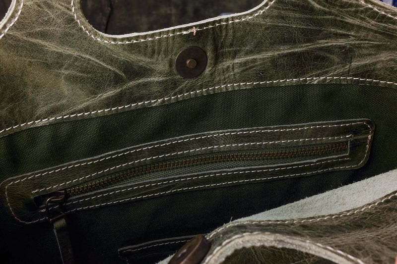 Handmade green leather tote bag inside pocket and closure detail