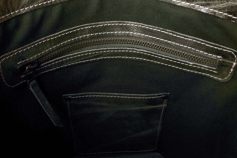 Handmade green leather tote bag inside pocket detail