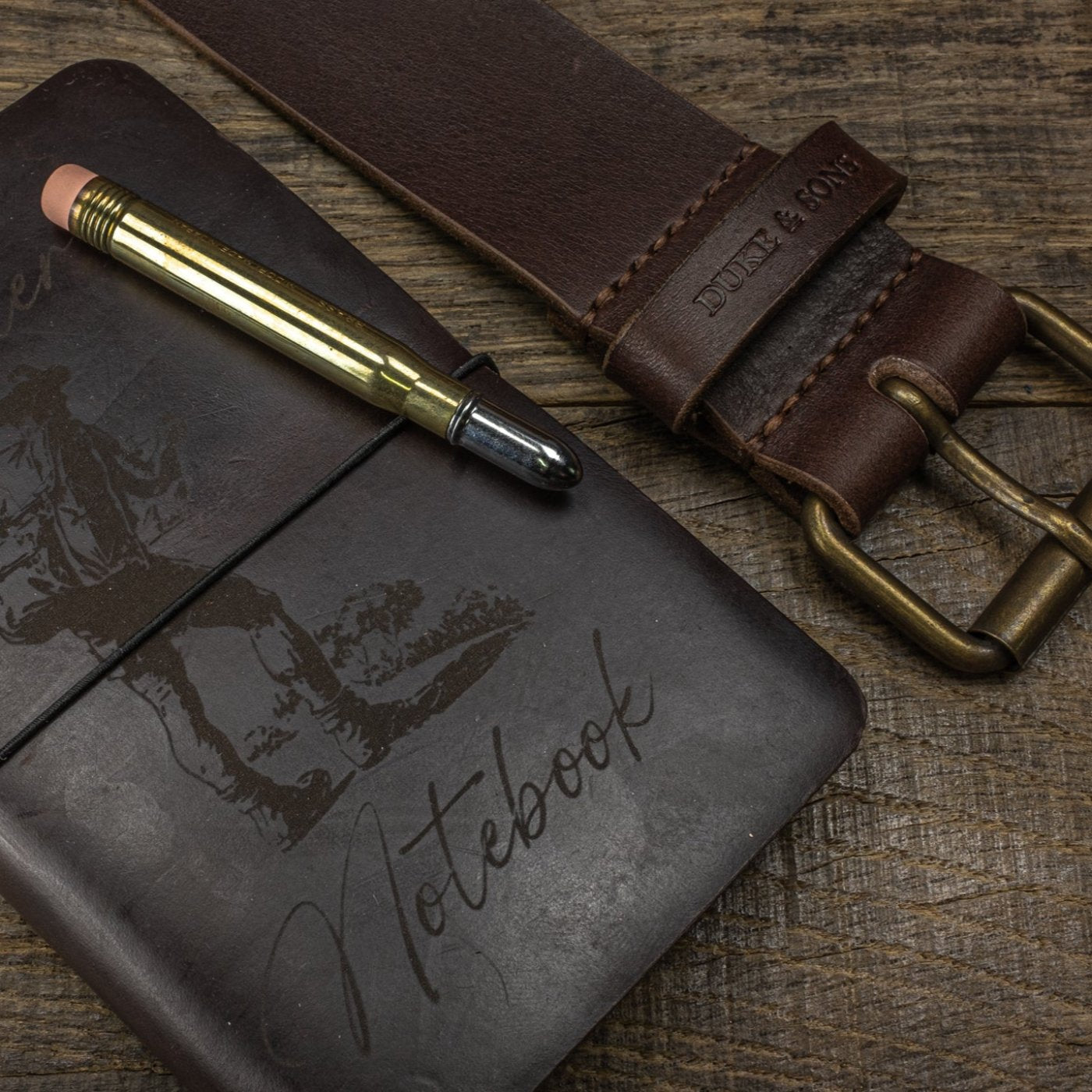 Duke and Sons horween leather Traveler notebook with logo scene with belt