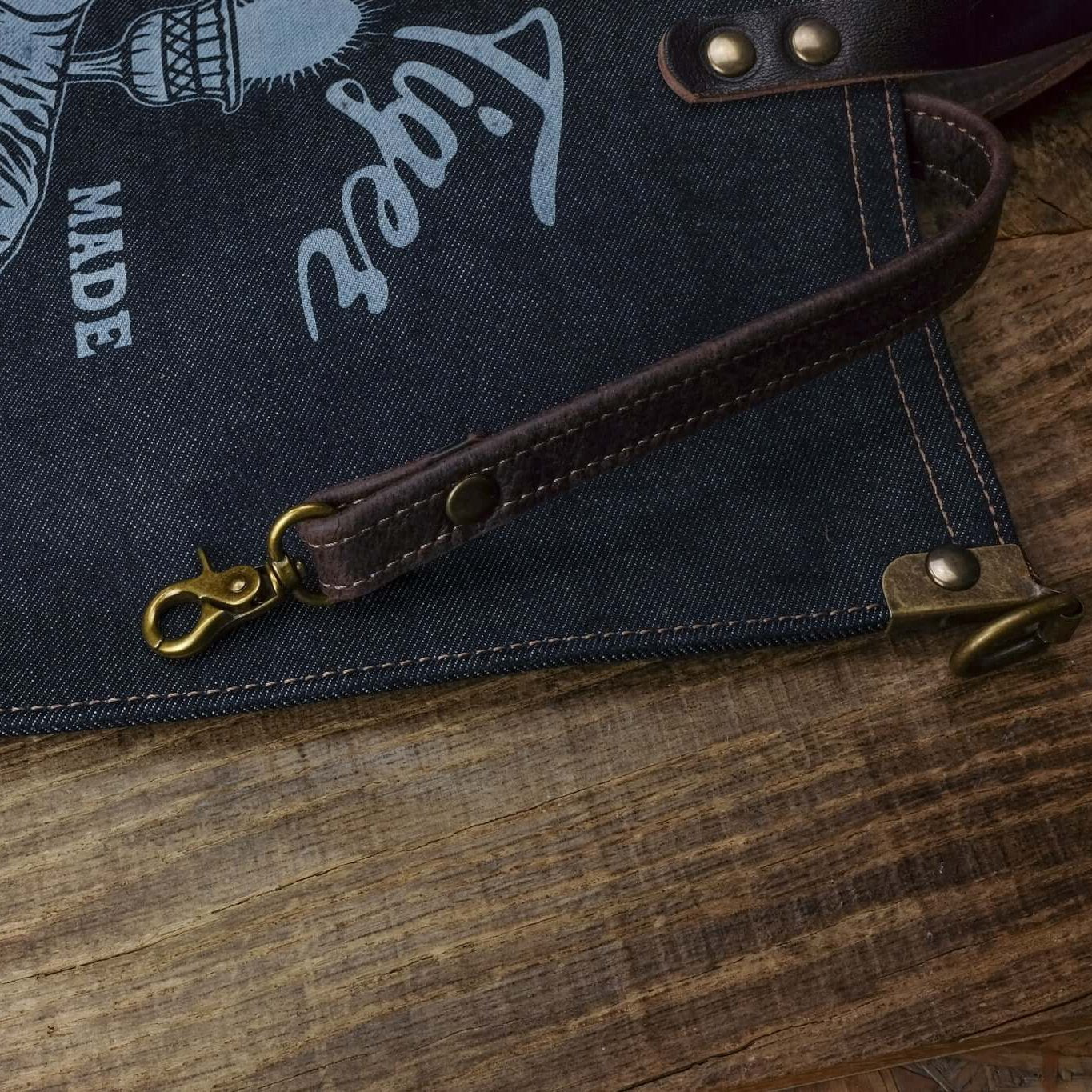 detail inside keychain selvedge denim tote bag, laser engraved logo White Tiger 