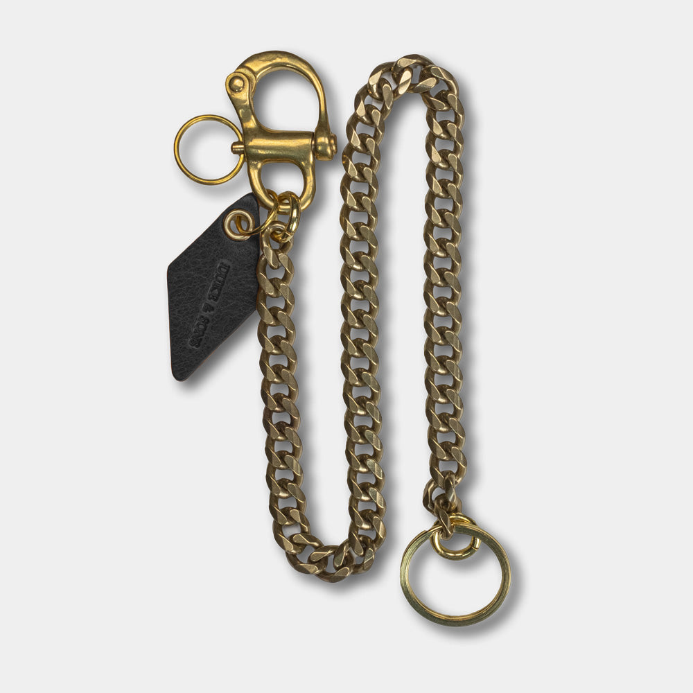 solid brass keychain wit Swedish nautical shackle and black leather diamd charm