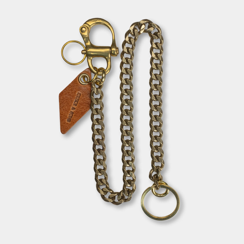 solid brass keychain with Swedish nautical shackle and cognac leather diamond charm