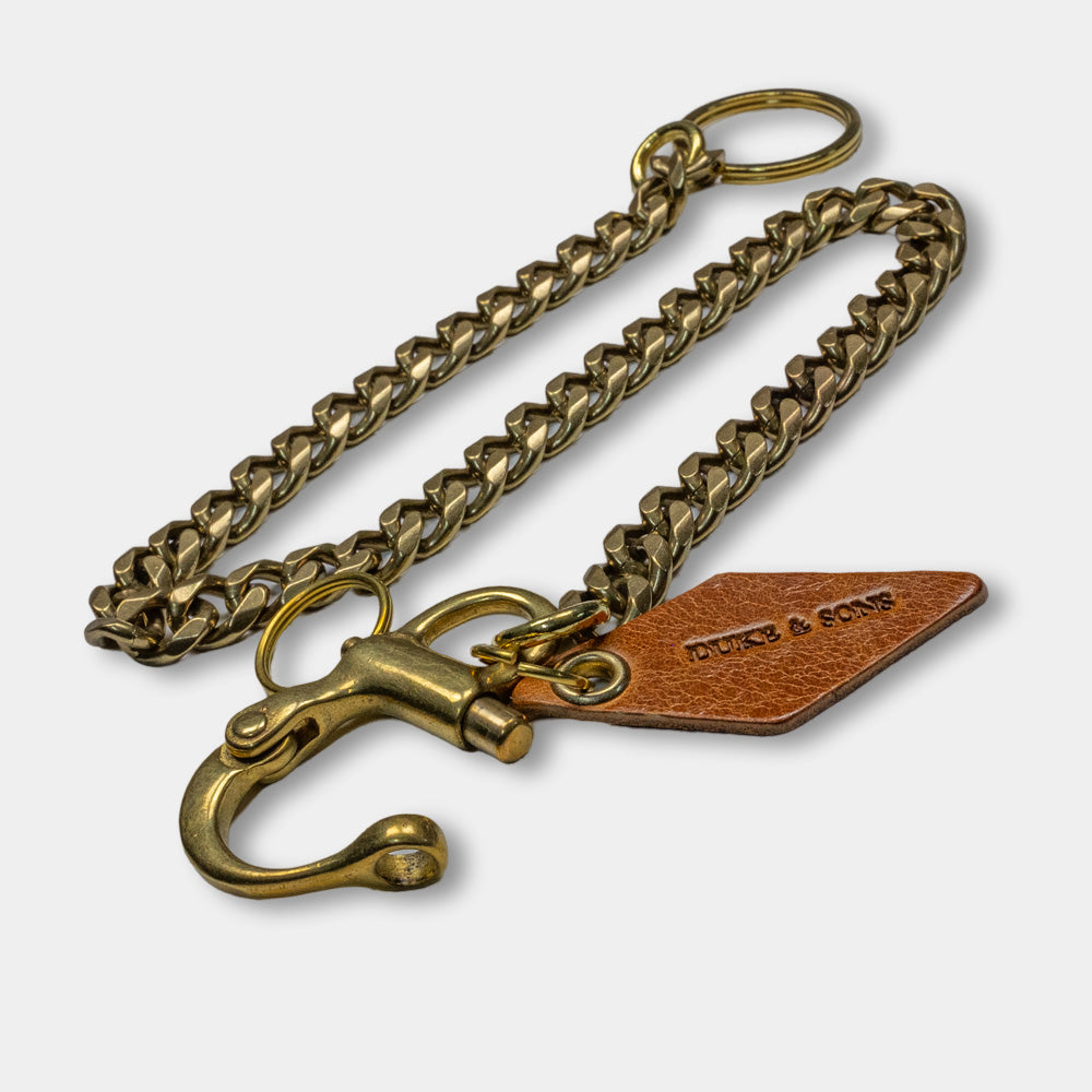 solid brass keychain with Swedish nautical shackle and cognac leather diamond charm top view open
