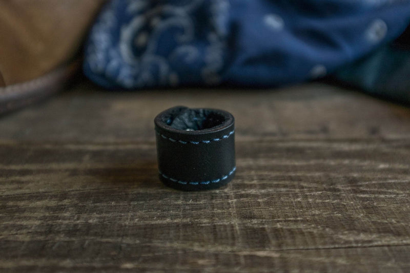 Woggle, bandana / neckerchief slide - in black leather. Duke & Sons Leather, close-up view