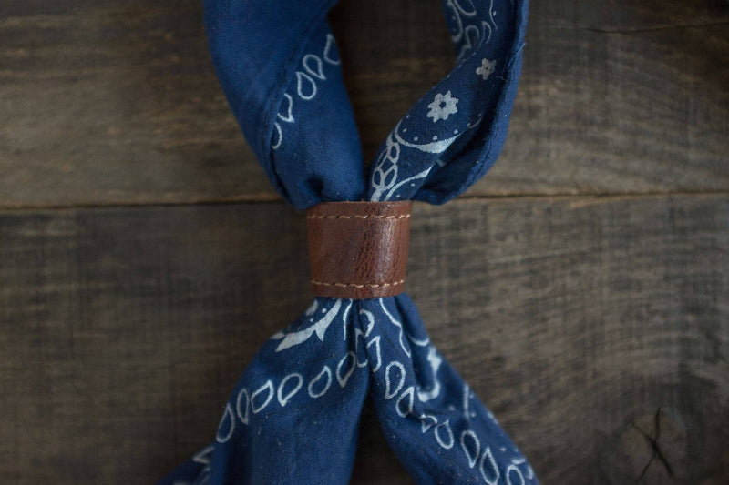 Woggle, bandana / neckerchief slide - in dark brown leather aroun d a blue bandana, Duke & Sons Leather