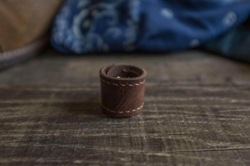 Woggle, bandana / neckerchief slide - in dark brown leather. Duke & Sons Leather, close-up view