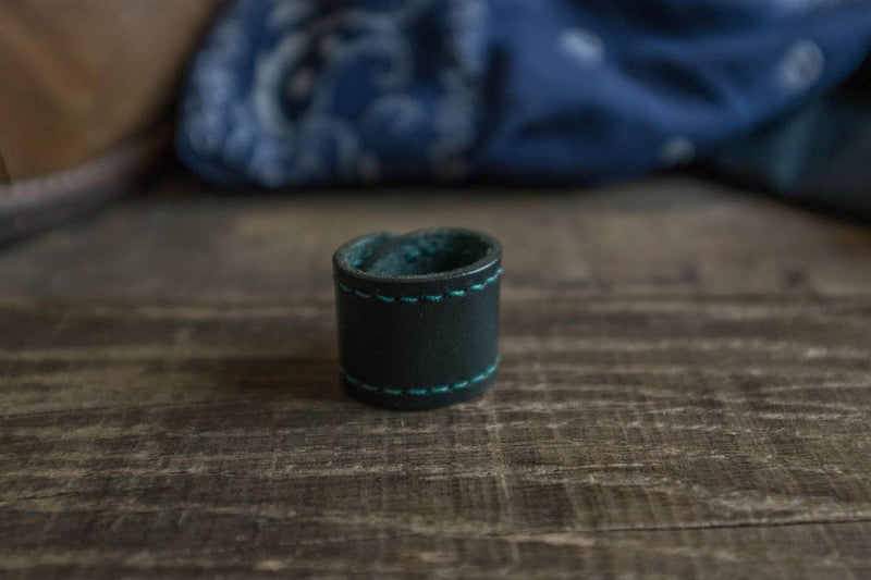 Woggle, bandana / neckerchief slide - in black leather. Duke & Sons Leather, close up view