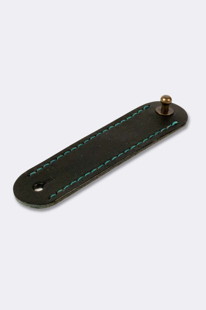 Woggle, bandana / neckerchief slide - in black leather. Duke & Sons Leather, slanted view